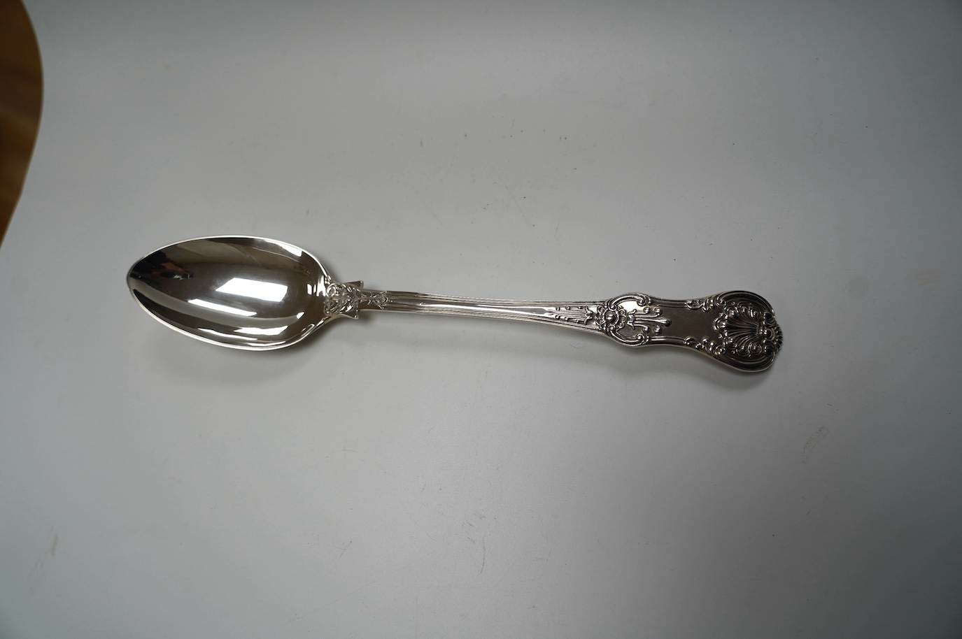 An early Victorian silver Queen's pattern basting spoon, by Hayne & Cater, London, 1842, with Coburg pattern bowl back, 29.9cm, 6.9oz. Condition - good